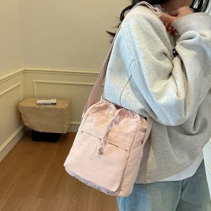 Casual Waterproof Nylon Crossbody Bag with Drawstring Closure Men and Women Versatile Shoulder Bag Chest Bag for Hiking Travel